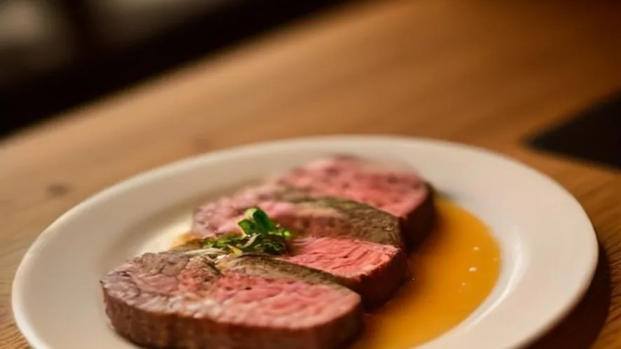 steak tough served on a wooden table, freshly made and ready to serve